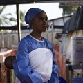 A health worker looks on at an Ebola transit centre in Beni in North Kivu province, DRC. Hugh Kinsella Cunningham/EPA