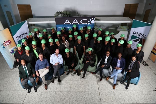 SAWIC members (in black and green) with SANRAL empowerment partners (seated from L-R) Maxwell Bukashe (Purple Sunshine), Mark Revees (Pilot CrushTec), Tom Swartz (Bell Equipment), Phumeza Kate (SAWIC EC chair), Kile Mteto (SAWIC president), Thabile Dube (Barloworld Equipment), Dumisane Mtsweni (Barloworld Equipment) and Pamela Bukashe (Purple Sunshine)
