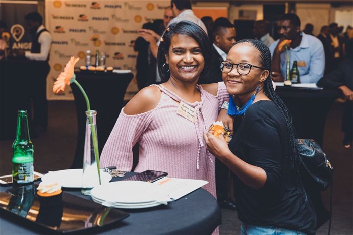 Vanitha Engelbrecht Orange Corner's co-ordinator with guest at launch of 2019 Incubator.