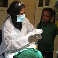 A child about to have his rotten tooth capped at the author’s clinic in Khartoum, Sudan. Author provided