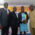 NSE boss Geoffrey Odundo, Brand Integrated partner Richard Mukoma present an award for the most admired brand in the food category in Kenya to Del Monte Kenya marketing manager – Margaret Nyoro, at the Most Admired Brands event at the Exchange in Nairobi. Looking on is Thebe Ikalafeng, founder and chairman of Brand Africa and Brand Leadership – the founders of the annual African survey. Image supplied.