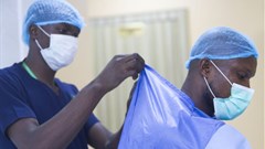 Doctors preparing to perform an operation. Shutterstock