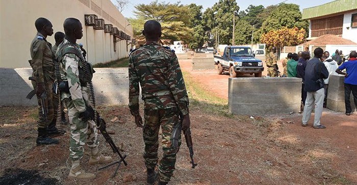 Central African Republic gendarmes and police officers are seen on January 2, 2016, in Bangui. Police in Bangui allegedly assaulted two French reporters from AFP recently. Credit: CPJ/AFP/Issouf Sanogo.