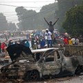 Community members in Zandspruit west of Johannesburg block roads after their illegal electricity connections were removed. EPA/Kevin Sutherland