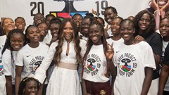 Naomi Campbell poses with female basketball players this week at the Hoop Forum organised by the SEED project in Senegal.