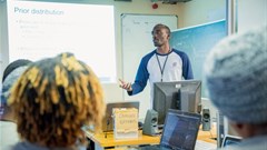 Dr Joseph Sempa of Sacema presenting at the 2019 Clinic on Meaningful Modelling of Epidemiological Data. AIMS-South Africa