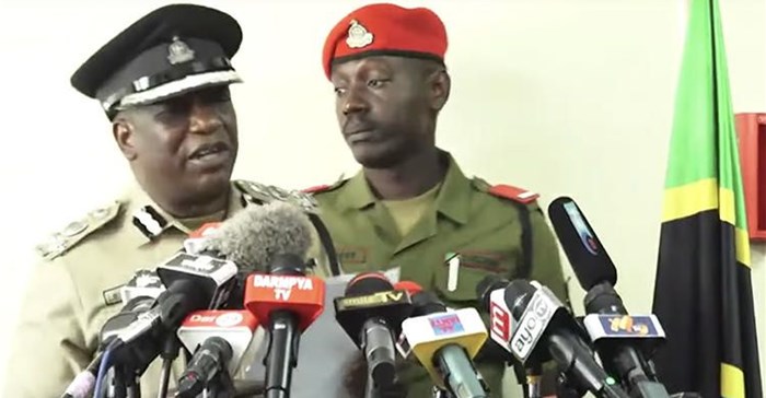 A screenshot of Dar es Salaam police chief Lazaro Mambosasa, left, speaking at a July 30 press conference. Mambosasa said that police have detained freelancer Erick Kabendera. Credit: CPJ/YouTube/Kwanza TV.