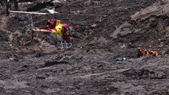 Firefighters search for victims after the Brumandinho tailings dam failure in January 2019. Yuri Edmundo/EPA