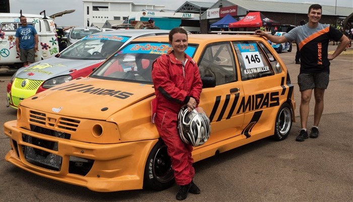 Kalyn Miller with her Kia Midas sponsored vehicle