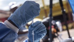 A health worker prepares to administer Ebola vaccination in the north-western Democratic Republic of the Congo.
EPA-EFE/STR
