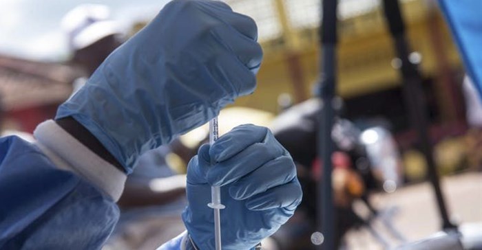 A health worker prepares to administer Ebola vaccination in the north-western Democratic Republic of the Congo.
EPA-EFE/STR