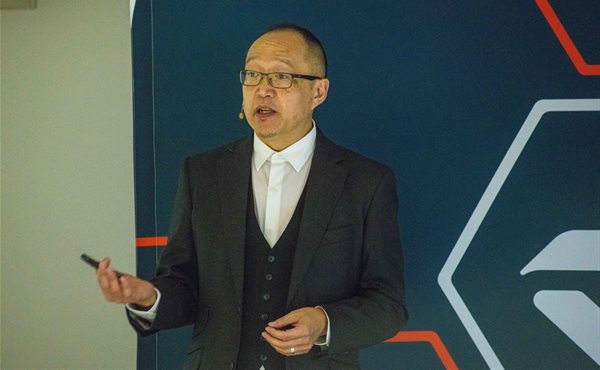 Dion Chang presenting his keynote at the RCS Retail Summit.