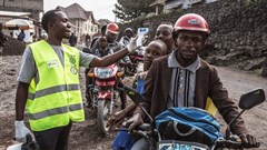A health worker checks people’s temperatures in Goma, DRC. Patricia Martinez/EPA-EFE