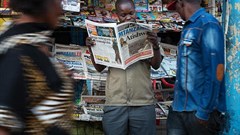A newspaper stand is seen in Mwanza, Tanzania, on September 19, 2015. Tanzania is currently considering legal amendments that could negatively affect press freedom. Credit: CPJ/AFP/Daniel Hayduk.