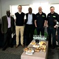 Pictured at the official opening are from left: Scott Smith (operations director, Van Dyck Floors Zimbabwe), Jonathan Pairemanzi (J. Link Carpets), Dr. Mehran Zarrebini (MD Van Dyck Floors), Louis Mudzongo (Classic Carpets), Dion Yatras (MD, Van Dyck Zimbabwe), Stuart Dearnaley (export manager, Van Dyck Floors) and Kuda Duri (account manager, Van Dyck Zimbabwe).