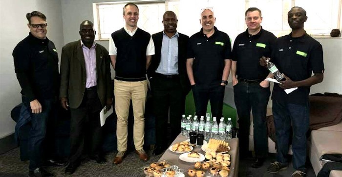 Pictured at the official opening are from left: Scott Smith (operations director, Van Dyck Floors Zimbabwe), Jonathan Pairemanzi (J. Link Carpets), Dr. Mehran Zarrebini (MD Van Dyck Floors), Louis Mudzongo (Classic Carpets), Dion Yatras (MD, Van Dyck Zimbabwe), Stuart Dearnaley (export manager, Van Dyck Floors) and Kuda Duri (account manager, Van Dyck Zimbabwe).