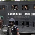Police officers are seen in Lagos, Nigeria, on August 5, 2019. Lagos police recently arrested publisher Agba Jalingo, who has been charged by federal authorities with treason. Credit: CPJ/AP/Sunday Alamba.