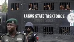 Police officers are seen in Lagos, Nigeria, on August 5, 2019. Lagos police recently arrested publisher Agba Jalingo, who has been charged by federal authorities with treason. Credit: CPJ/AP/Sunday Alamba.