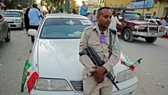 A police officer is seen in Hargeisa, Somaliland, on May 16, 2016. Police in Hargeisa recently arrested Horyaal 24 TV owner Mohamed Osman Mireh. Credit: CPJ/AFP/Mohamed Abdiwahab.
