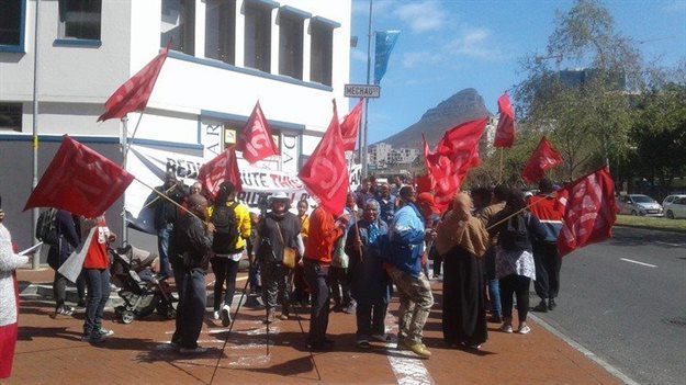 Housing activists picket outside the location of a proposed new development called The Vogue in Cape Town’s city centre. Photo: Sandisiwe Shoba /GroundUp