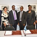 Signing ceremony (L-R): Garth Strachan, acting CEO of SABS; Jodi Scholtz, Group Chief Operating Officer at the dti and co-administrator of SABS; Tshenge Demana, Chief Director of Technical Infrastructure Institutions at the dti and co-administrator of SABS; Alfred Kgotlaesile, Manager Compulsory Standards at BOBS; Masego Marobela Managing Director of BOBS; and Keo Segomelo, Director Standards at BOBS.