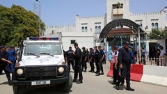 Police officers are seen at El Harrach prison in Algiers, Algeria, on June 13, 2019. Freelance journalist Sofiane Merakchi was recently sent to the prison for pre-trial detention. Credit: CPJ/Reuters/Ramzi Boudina.