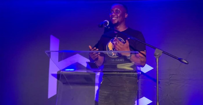 Mo Flava up on stage at Heavy Chef and Discovery Business Insurance's Inspire Sessions event. ©