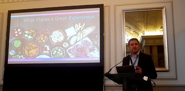 Schaefer presenting at the Adobe CX Forum.