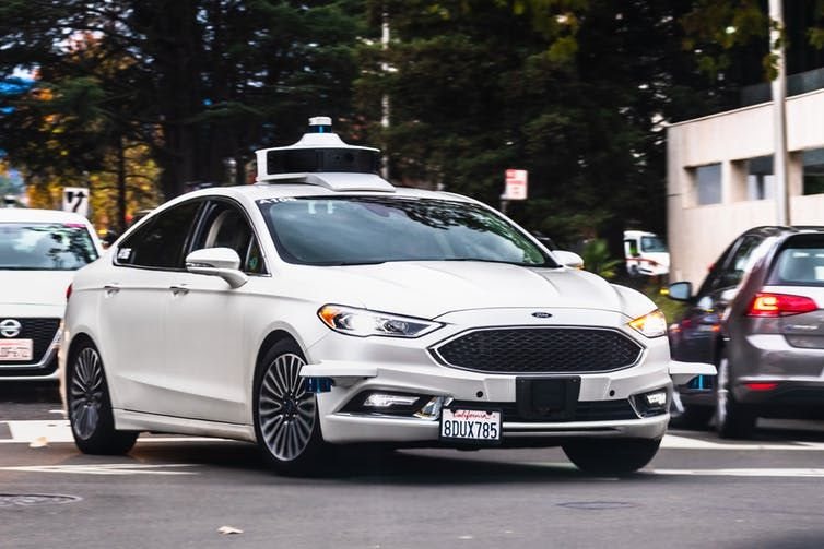 A Lyft self-driving car drives on the streets in Palo Alto, Calif., in December 2019. (Shutterstock)