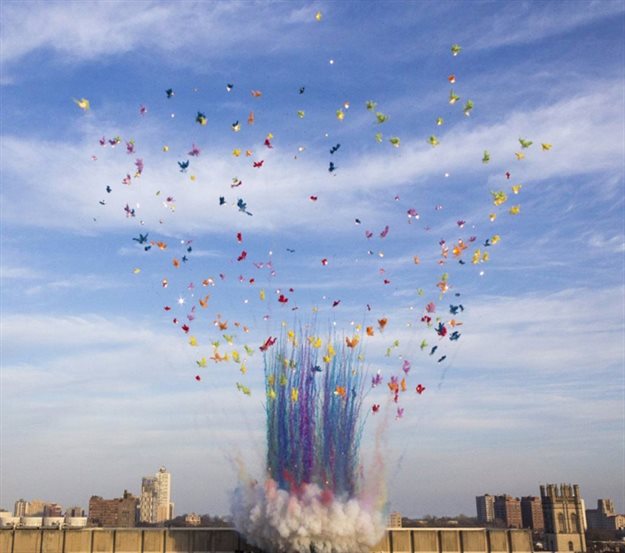 Cai Guo-Qiang's &quot;Mushroom Clouds&quot; above the Regenstein Library at the University of Chicago. Image courtesy of Fireworks.