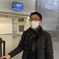 Bill Chen at San Francisco International Airport after arriving on a flight from Shanghai. Chen said his temperature was screened at the Shanghai airport before he departed.
AP Photo/Terry Chea