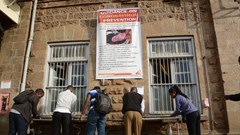 Commuters outside Nairobi Railway Station wash their hands before entering the train station as a preventive measure against COVID-19. Photo by Dennis Sigwe/SOPA Images/LightRocket via Getty Images