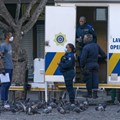 South African Law Enforcement officers check movement papers during the country’s 21-day national total lockdown. Nic Bothma/EPA