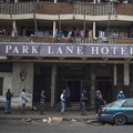 South Africans practise social distancing while they queue outside a supermarket in Hillbrow, Johannesburg during the country’s lockdown. Photo by Marco Longari/AFP via Getty Images