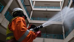 A member of the Nigerian Health Task Force fumigates a building in Abuja, Nigeria, as the city struggles to curb the spread of coronavirus. COVID-19 Photo by Kola Sulaimon/AFP via Getty Images