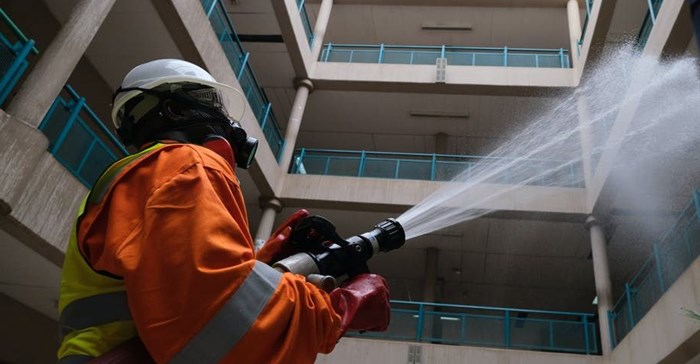 A member of the Nigerian Health Task Force fumigates a building in Abuja, Nigeria, as the city struggles to curb the spread of coronavirus. COVID-19 Photo by Kola Sulaimon/AFP via Getty Images