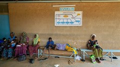 Women and children wait to be treated at a health clinic in northern Burkina Faso. Giles Clarke/UNOCHA via Getty Images