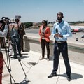 TV reporters prepare for a live broadcast during a strike by airline workers in Nairobi. Yasuyoshi Chiba/AFP via Getty Images.