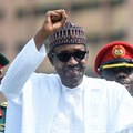 President Muhammadu Buhari raises his fist during an inspection of honour guards on parade to mark Democracy Day in Abuja, on June 12, 2019.
Pius Utomi Ekpei/AFP via Getty Images