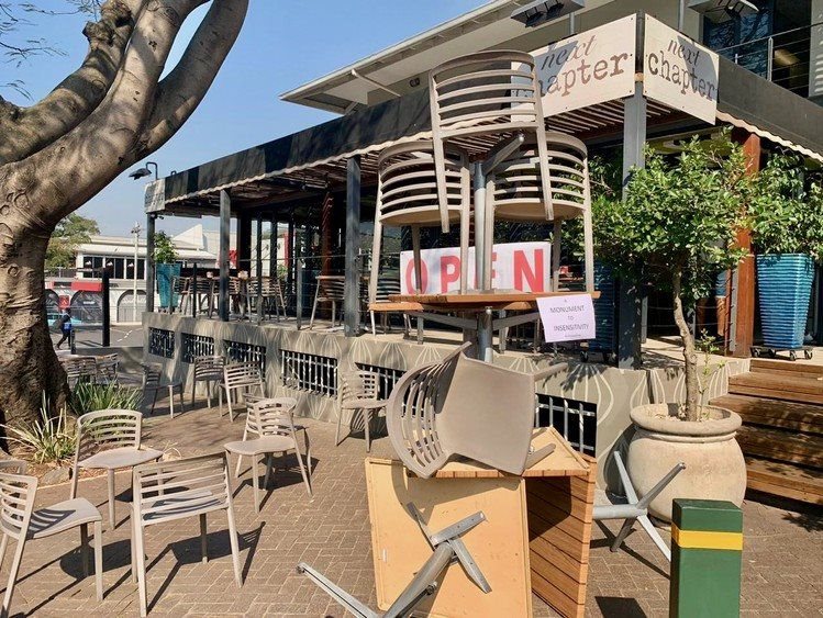 Staffers at the Next Chapter Restaurant on Florida Road, Durban, staged a project by placing tables and chairs outside the restaurant. Photo: Nokulunga Majola