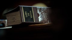 A volume of the Law of Kenya sits on a judge’s desk during trial. Yasuyoshi Chiba/AFP via Getty Images