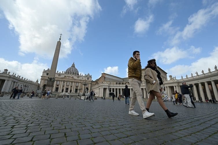 Only a handful of tourists at the usually busy St. Peter’s Square at the Vatican.