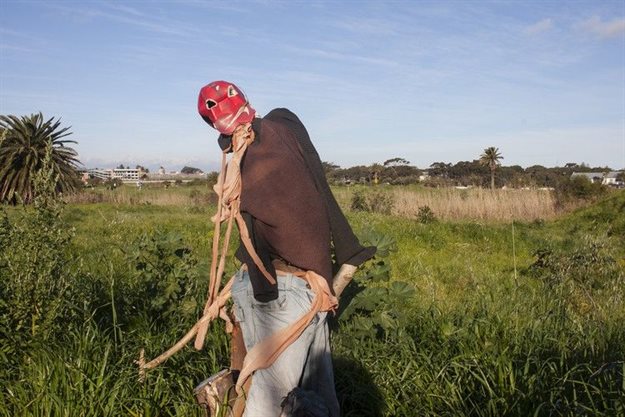 A scarecrow guards the far end of the River Club site. Photo: Steve Kretzmann