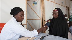 A woman gets her blood pressure checked at a camp for internally displaced people in Maiduguri, north-east Nigeria. Stefan Heunis/AFP via Getty Images