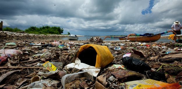 Plastic litters a beach in Indonesia. ,
