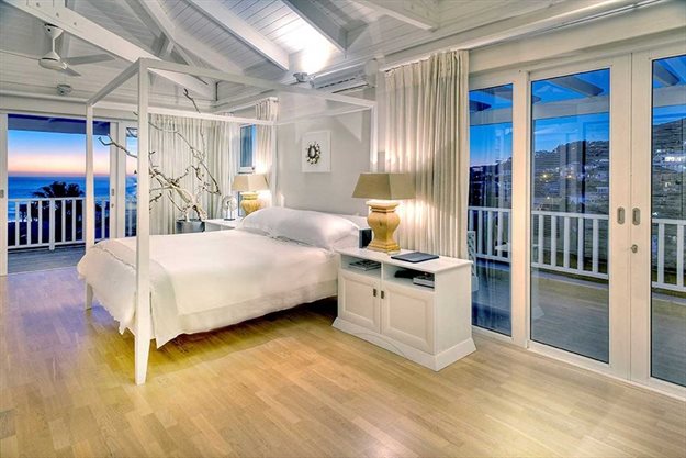 DON'T: Capturing the view whilst not detracting from the room’s interior can be very tricky without a good camera and a solid understanding of how to use factors like lighting and depth. Photo credit: Anton de Beer from Anton de Beer Photography