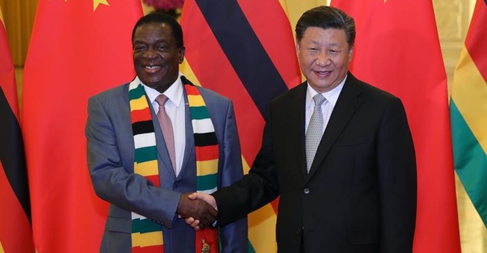 Zimbabwe’s President Emmerson Mnangagwa meets his Chinese counterpart President Xi Jinping in Beijing, in 2018. EPA-EFE/Lintao Zhang / POOL