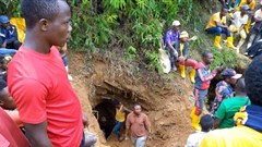 Rescuers work in Kamituga, South Kivu, at the entrance of one of the mines which collapsed following torrential rains trapping dozens of artisanal miners in September 2020. Photo by Stringer/AFP via Getty Images