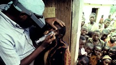 A health worker examines a child for signs of trachoma Joe McNally/Getty Images