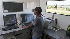 Healthcare worker, Boitsholo Mfolo, inside the digital x-ray truck at one of Africa Health Research Institute’s mobile screening camps in rural KwaZulu Natal, South Africa. Samora Chapman/ Africa Health Research Institute